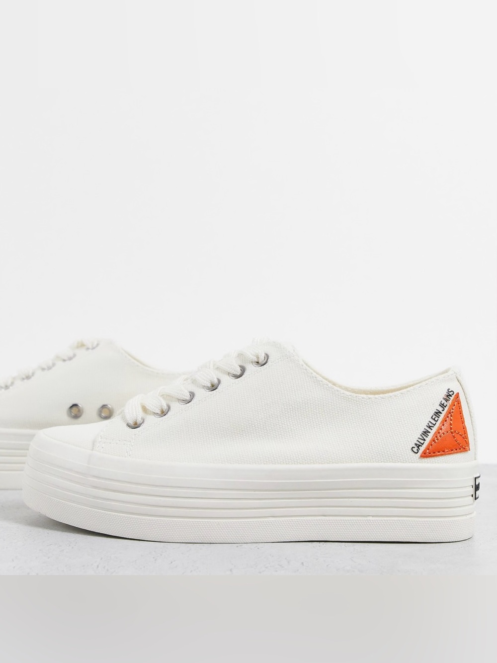 Calvin Klein White Low-Top Platform Canvas Sneaker with Orange Heel Tab